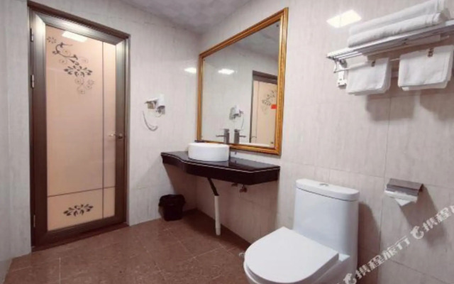 Youge Shangpin Hotel (Xinxing Times Square Bus Station)