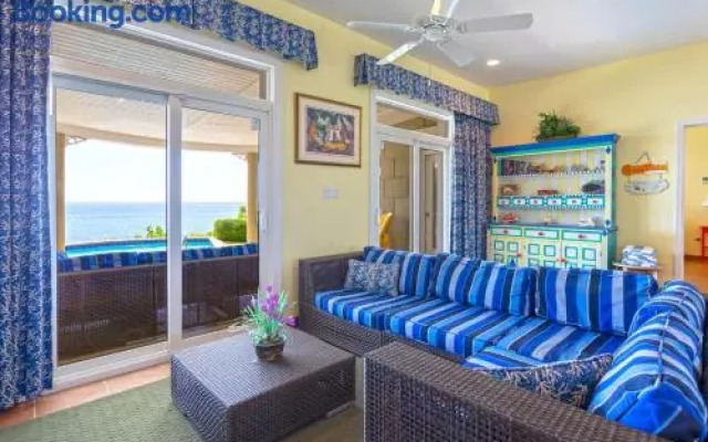 Cayman Castle & Guesthouse by Grand Cayman Villas & Condos