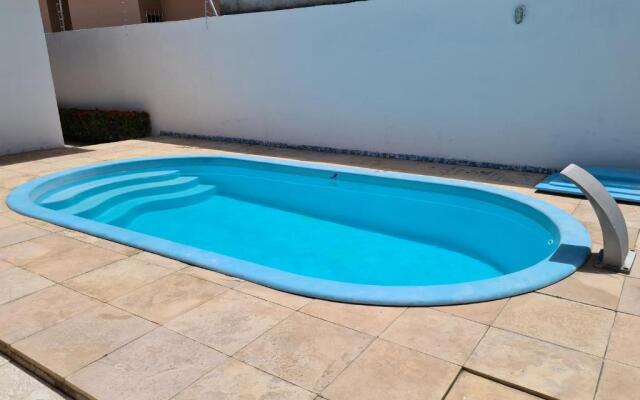Casa na Aruana com piscina e 3/4