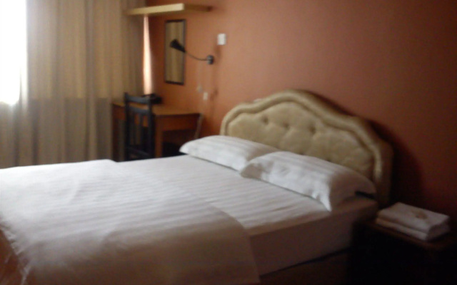 Rafflesia Inn – Guest Rooms – Kuching