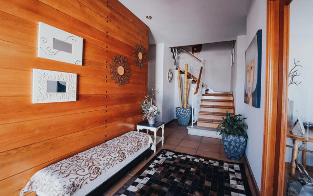 Villa con piscina a pie de playa