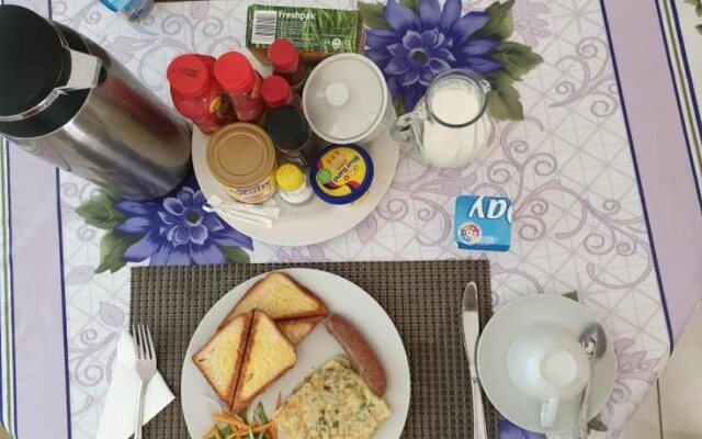 Home Up Guest House