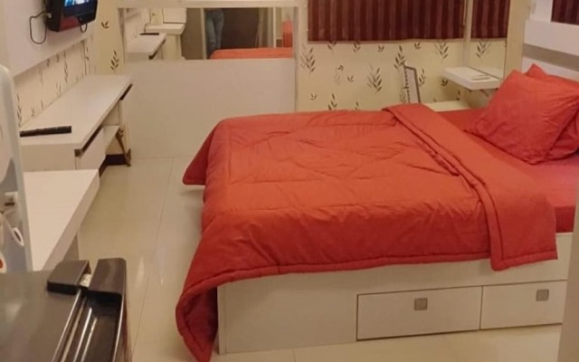 The Suites Metro Ananda Home