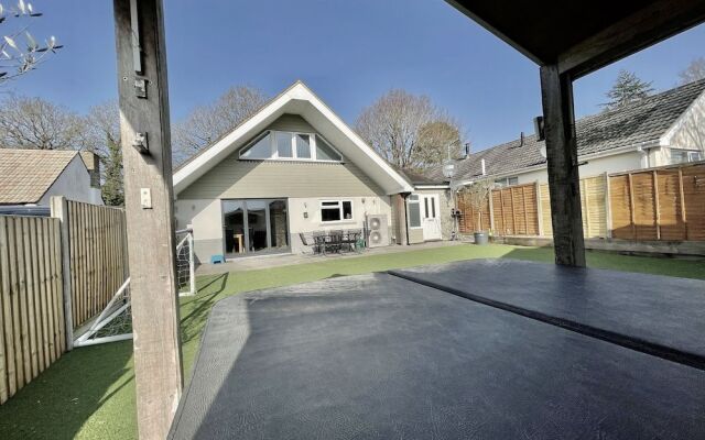 Four Corners Holiday Home with Hot Tub & Sauna