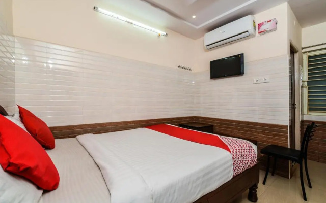 Varsha Grand Residence by OYO Rooms