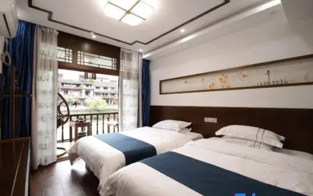 Xiongdi Renjia Diaojiaolou Inn