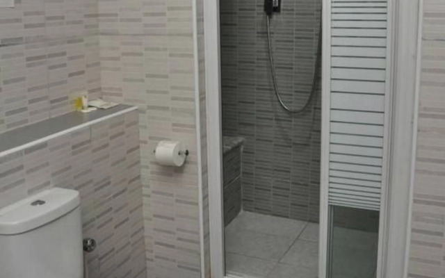 De Brass Suites Hotel