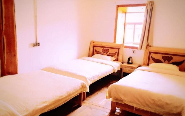 Daocheng Mizang Hostel