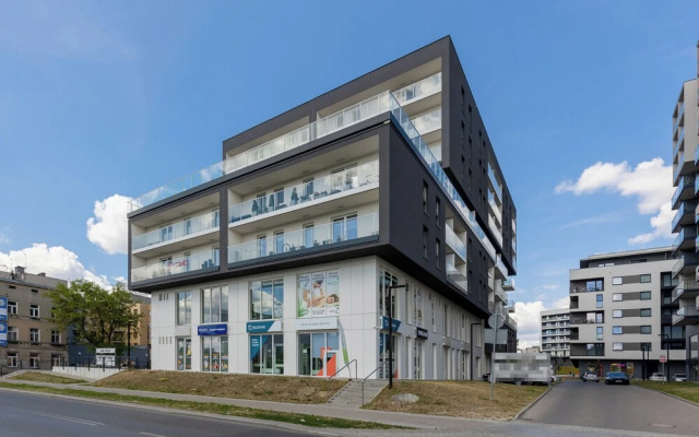 Studio Near Manufaktura Łódź by Renters