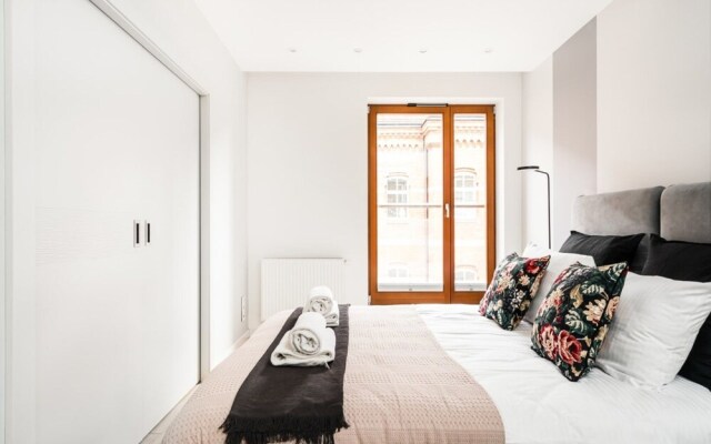 Feel Cracow s Modern Vibe in Gorgeous Penthouse Views Over Jewish Quarter