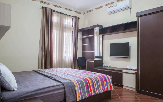 RedDoorz Plus near Isola UPI