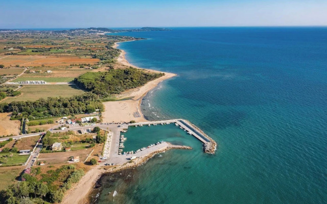 Kourouta Beachfront Escape Walk to the Waves