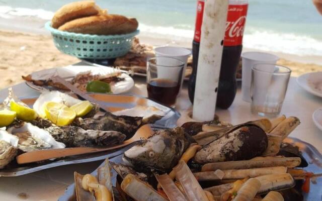 Art riad au bord de la mer