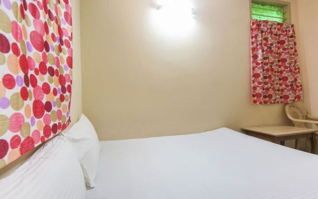 Spot On 60491 Harini Lodge