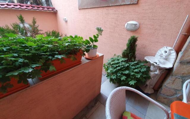 Orange Flower Apartments