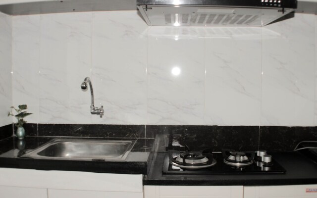 Minimalist And Homey 1Br At Bassura City Apartment