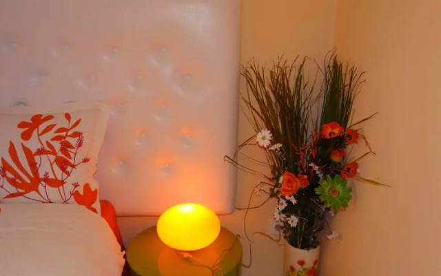 Orange Flower Apartments 1