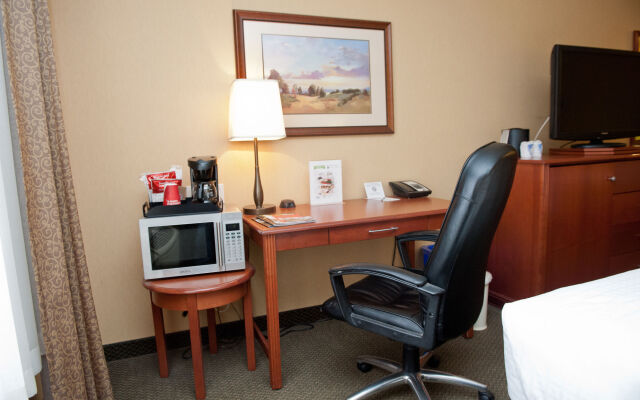 Merit Hotel & Suites
