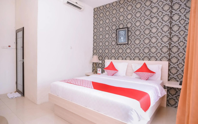 Capital O 854 Ub Caisar Hotel