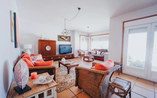 Villa con piscina a pie de playa