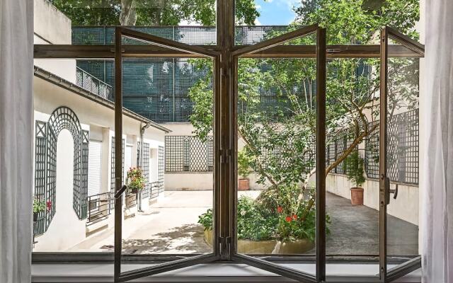 Saint Germain Bon March Chic Three Bedroom