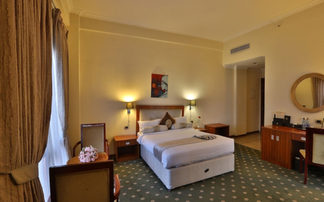 Kenenisa.. Oasis International Hotel