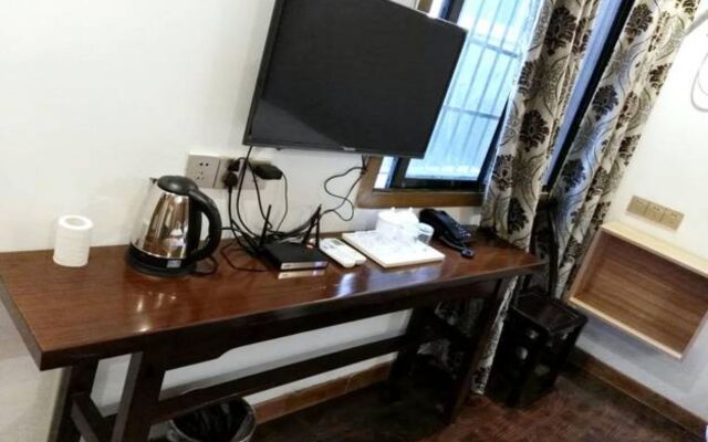 Qijiayi Theme Hostel No.2 Shop