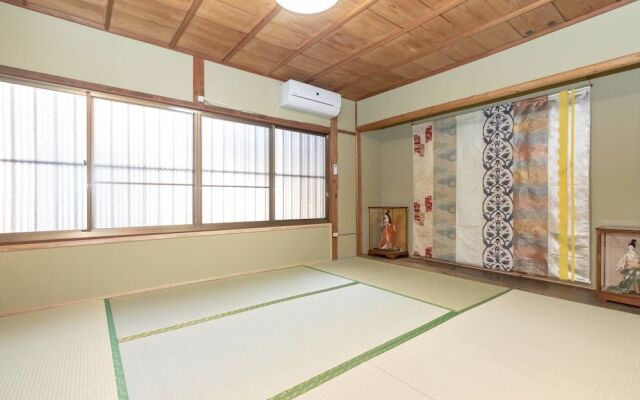 Jyuraku Tomi