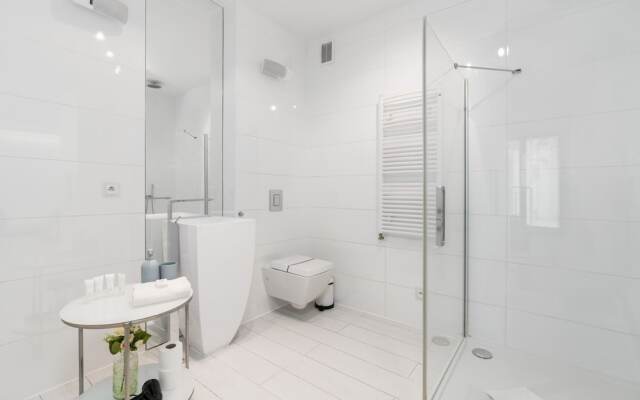 Minimalist Apartment Poznan by Renteres
