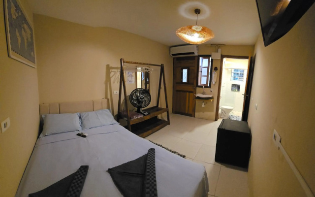 Quarto 100m da praia Pereque