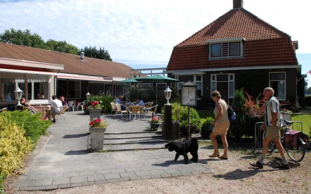 Restyled House With Fireplace, Surrounded by Green