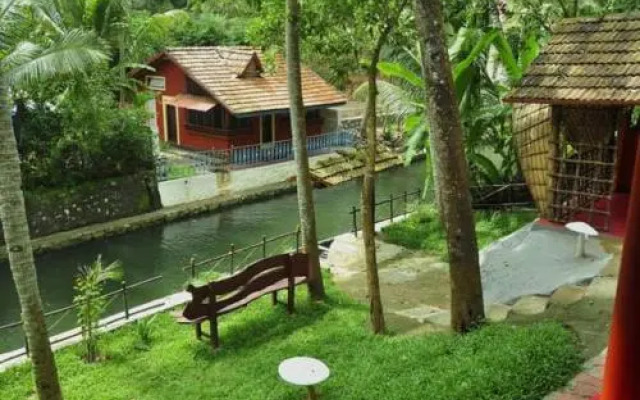 Roomys Nest Ashtamudi Homes
