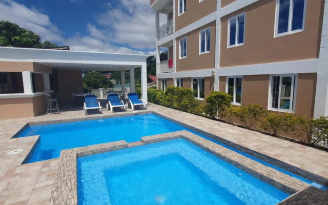 Lovely 2-bedroom apartment with shared jacuzzi & pool