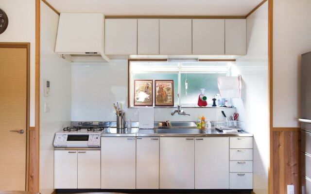 Tsubaki House