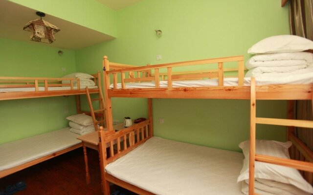 Zhengfu Caotang Dexin Inn