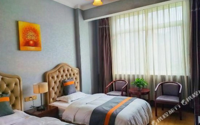 Chengdu Hexing Qingju Hotel (Pixian Hongguang Xihua University)
