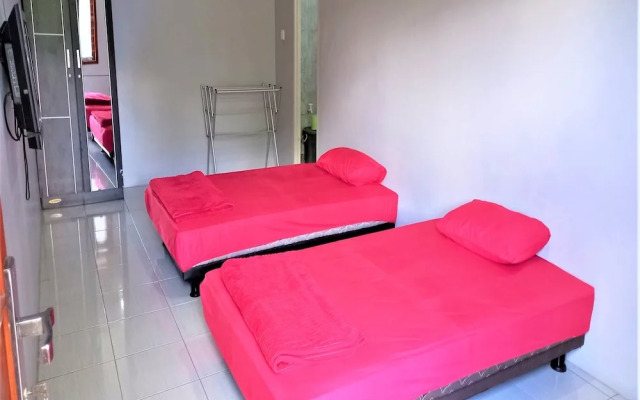 Nabila Syar i Guesthouse by ZUZU