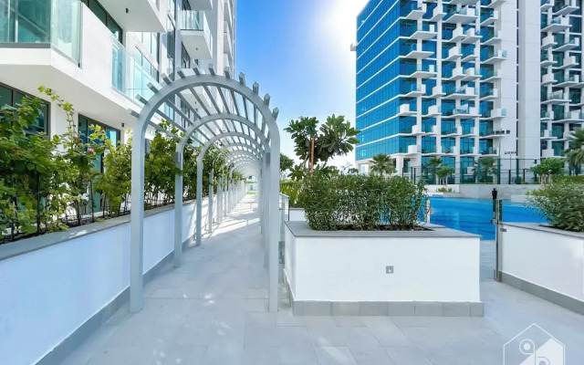 Cozy 1BR With Balcony & Views in Azizi Fawad