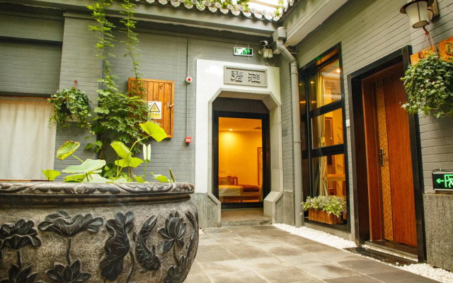Qiuguo Hutong Courtyard Hotel