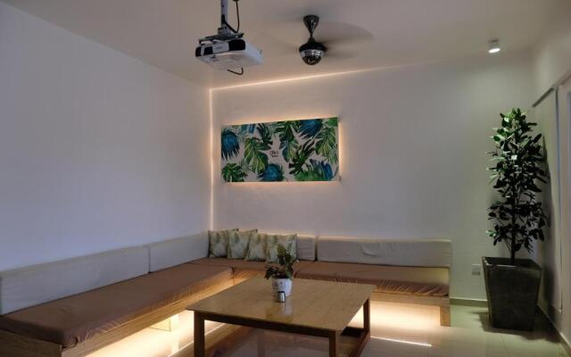 Tung's Tropika - With a Wooden Hut by a Lake