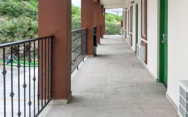 Capital O Palms Hotel