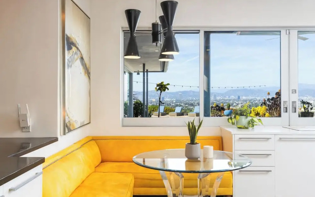 Stylish Hillside Retreat with Pool & Views