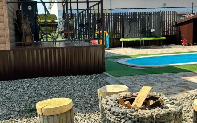 West House with swimming pool and sauna