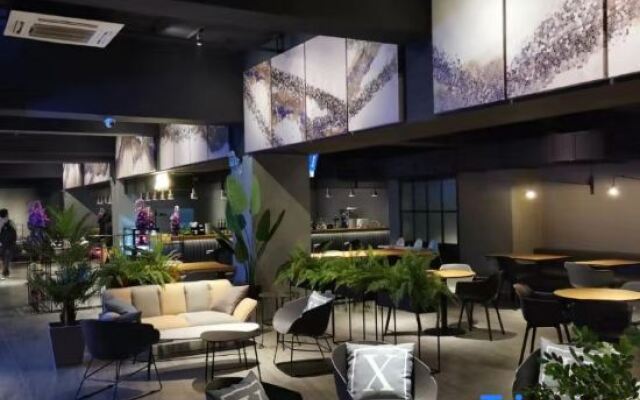 X Hotel