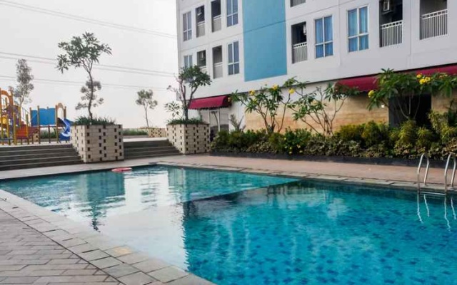 Studio Homey and Relaxing at Grand Dhika City Apartment By Travelio – Pool – Bekasi