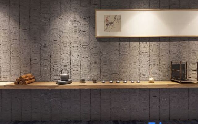 QIANNA HOTEL (Xinxiang Hualan Avenue Pangdonglai Shopping Plaza)