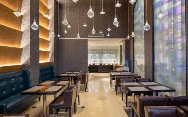 Suzhou Huaxi Meishi Hotel (Heiyi Wujiang Branch)