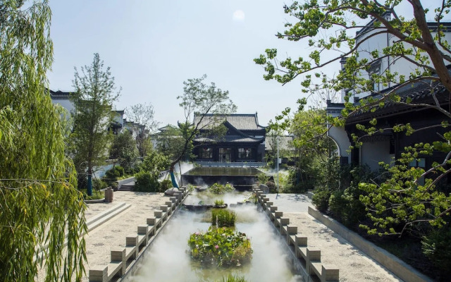 Xinhualian Lv Xin Gu Hotel