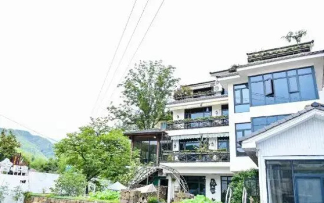 Anji Anshe Homestay (Yunshang Grassland Shop)