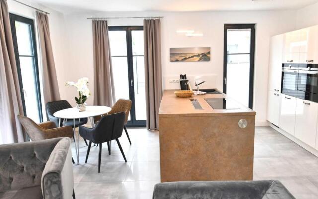 Villa "Levante" F659 Gartenwohnung mit Kamin, Sauna, Terrasse